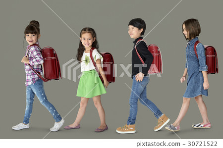 A group of children with a backpack A group of children with a backpack 30721522