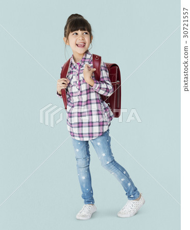 A girl with backpack is smiling A girl with backpack is smiling 30721557