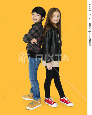 Boy and girl are posing on a shoot Boy and girl are posing on a shoot 30721563
