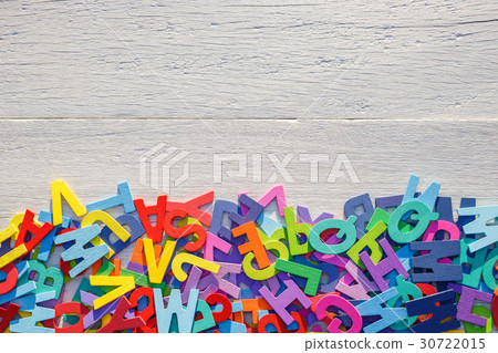 Colorful wooden alphabet. Top view on white wooden Colorful wooden alphabet. Top view on white wooden 30722015