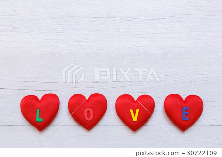 Top view red heart on white wooden plank. For love or valentine day concept Top view red heart on white wooden plank. For love or valentine day concept 30722109