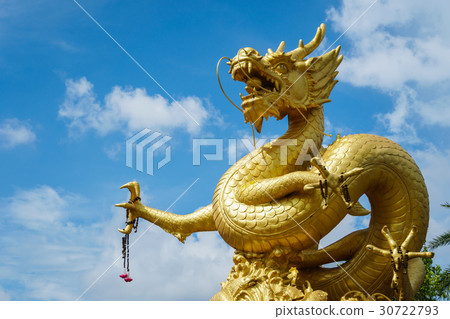 Golden Chinese dragon statue on blue sky background in Phuket Town, Thailand 30722793