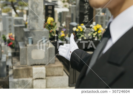 a visit to a grave  30724604