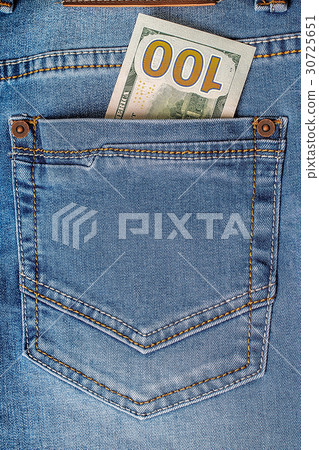Dollar banknotes in jeans pocket closeup. 30725651