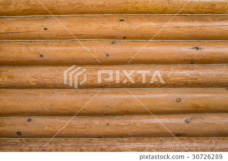 Wooden wall of a log house. Log Cabin Or Barn Wooden wall of a log house. Log Cabin Or Barn 30726289