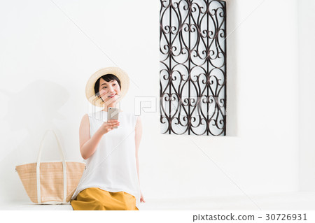 A young lady (a smartphone) A young lady (a smartphone) 30726931