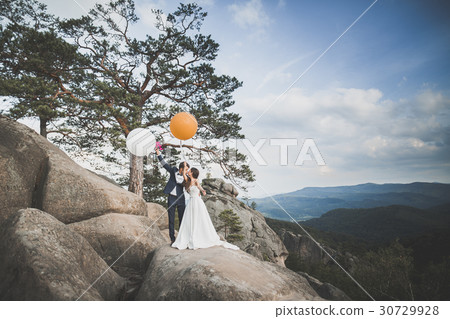 Beautiful wedding couple, bride and groom, in love Beautiful wedding couple, bride and groom, in love 30729928