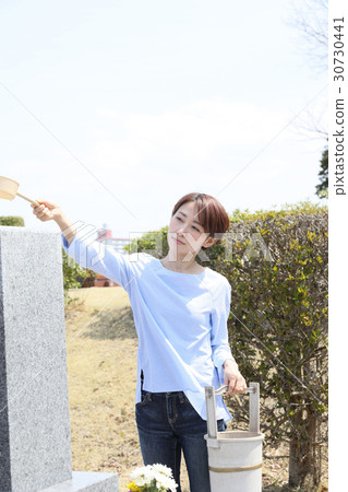 a visit to a grave  30730441