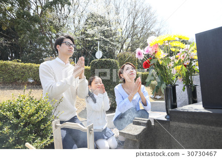 a visit to a grave  30730467