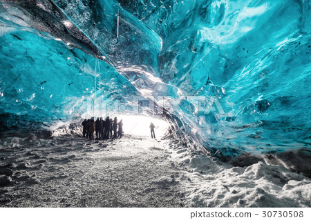 Landscape Ice Cave, with silhouette tourist group  30730508