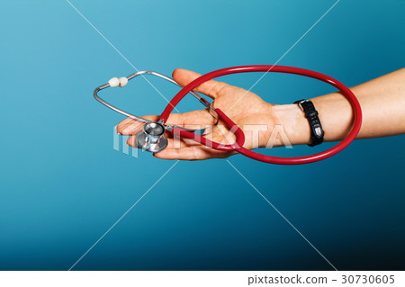 Stethoscope close-up in the doctor's hand 30730605