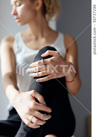 Beautiful girl, sitting on a window-sill Beautiful girl, sitting on a window-sill 30737286
