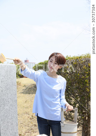 a visit to a grave  30737384