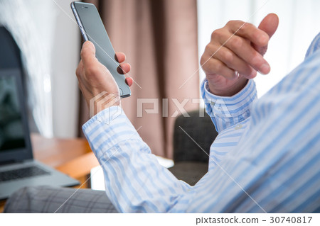 Middle-aged male adult men who use smartphones mobile phone research work Middle-aged male adult men who use smartphones mobile phone research work 30740817