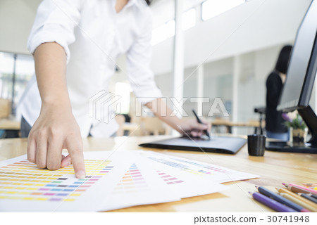 Graphic designer use graphics tablet and computer 30741948