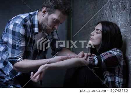 Desperate drug users injecting drug indoors Desperate drug users injecting drug indoors 30742480
