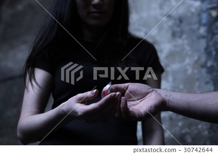 Heroin dealer selling packet full of drug to freak Heroin dealer selling packet full of drug to freak 30742644