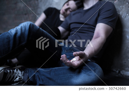 Depressive obsessed couple suffering from overdose Depressive obsessed couple suffering from overdose 30742660