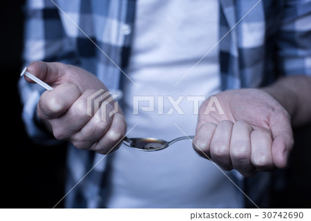 Fearless junky preparing drug dose in the darkness Fearless junky preparing drug dose in the darkness 30742690
