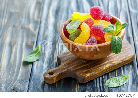 Fruit marmalade in a wooden bowl. 30742797
