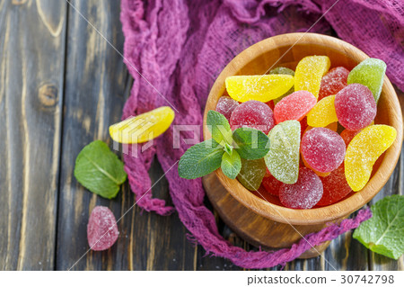 Wooden bowl with fruit marmalade. 30742798