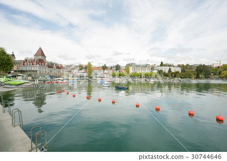 Ouchy port and Chateau, Lausanne, Switzerland Ouchy port and Chateau, Lausanne, Switzerland 30744646