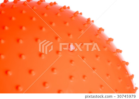 Close up of an orange fitness ball isolated Close up of an orange fitness ball isolated 30745979