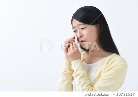 A sad grieving young lady A sad grieving young lady 30751537