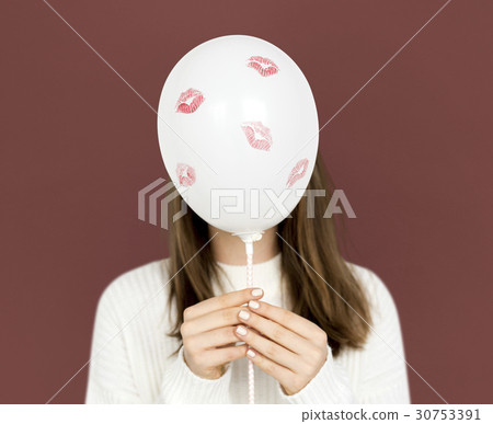 Young Lady Holding Balloon Kiss Marks Young Lady Holding Balloon Kiss Marks 30753391