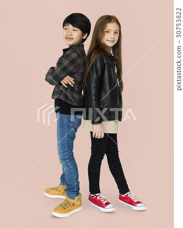 Boy and girl are posing on a shoot Boy and girl are posing on a shoot 30753822