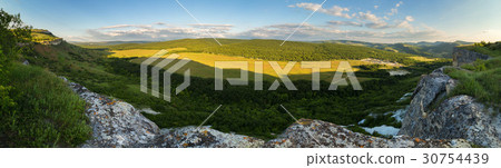 Evening panorama of the green valley. View from 30754439