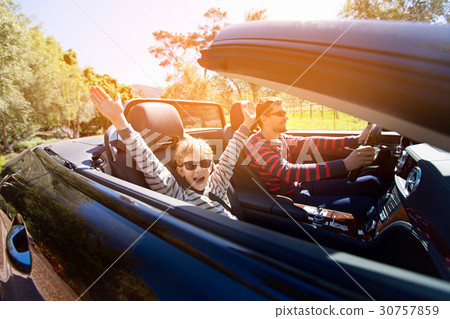 family in convertible car family in convertible car 30757859