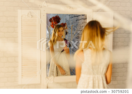 The reflection in the modern mirror of the 30759201