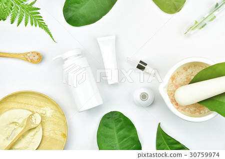 Cosmetic bottle containers with herbal leaves. Cosmetic bottle containers with herbal leaves. 30759974