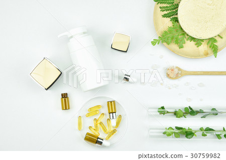 Cosmetic bottle containers with herbal leaves. Cosmetic bottle containers with herbal leaves. 30759982