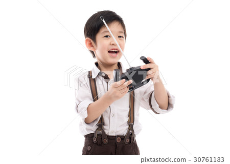 child holding radio remote control child holding radio remote control 30761183