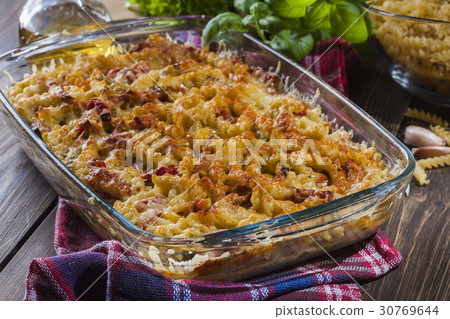 Casserole fusilli pasta with sausage 30769644