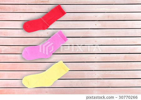 sock on wood background 30770266
