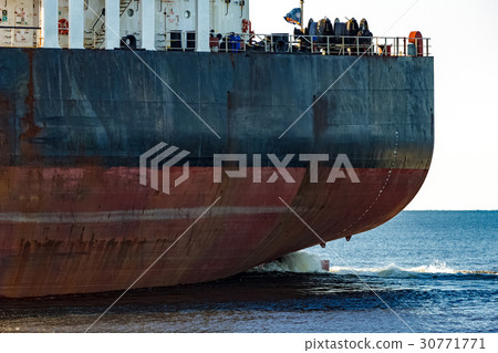 Black cargo ship's stern 30771771