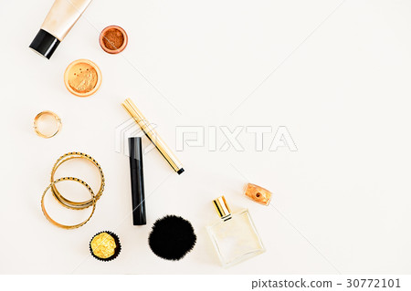 Gold, black and white. Woman's beauty makeup  30772101