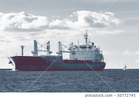 Cargo ship moving 30772745