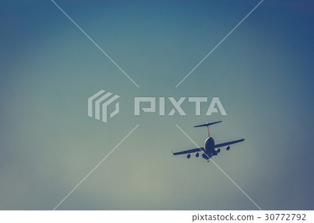 Passenger aircraft in the sky 30772792