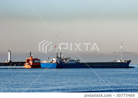 Blue cargo ship 30773489
