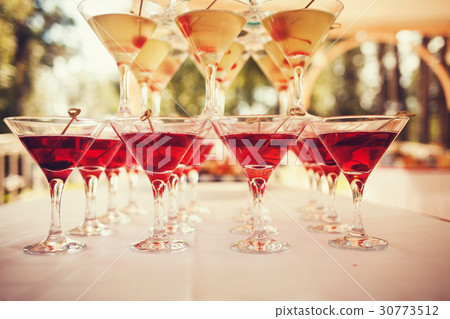 Glasses of cocktails Glasses of cocktails 30773512