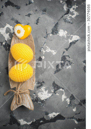 Yellow crocheted easter eggs and heart Yellow crocheted easter eggs and heart 30774086
