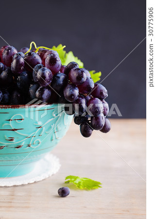 Grape with Green Leaves on Vintage Background Grape with Green Leaves on Vintage Background 30775906