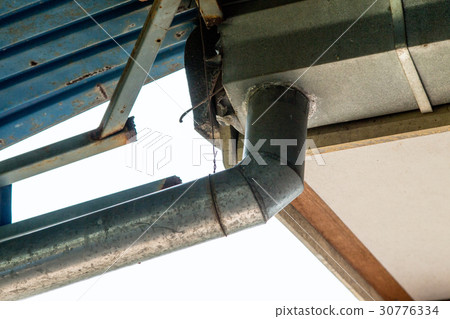 Corner of the house with gutters zinc 30776334