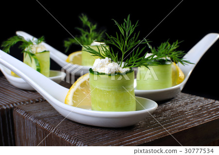Cucumber canape with ricotta Cucumber canape with ricotta 30777534