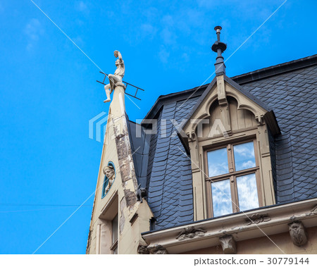 Garret roof with sculptures, Riga, Latvia. Garret roof with sculptures, Riga, Latvia. 30779144