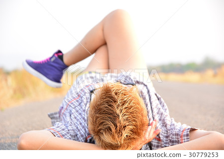 Woman relax on road and under the sky 30779253